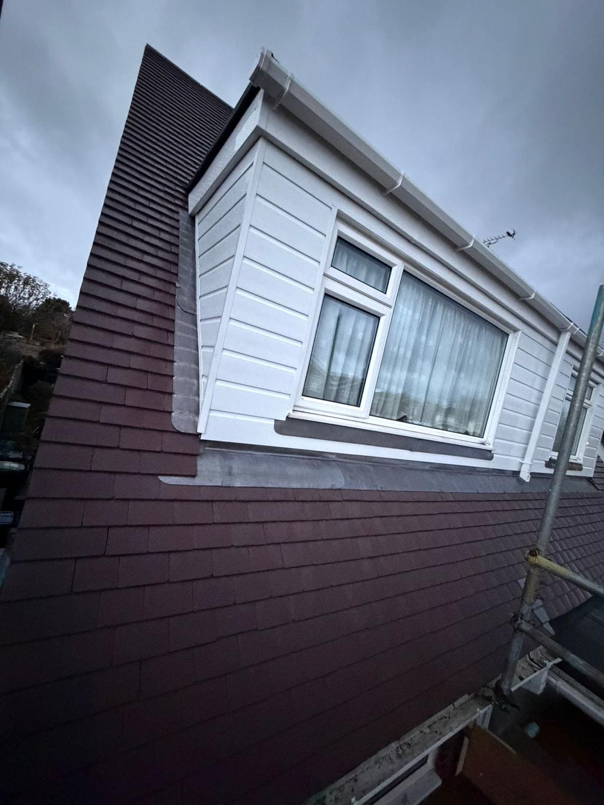 Dark tiled dormer window