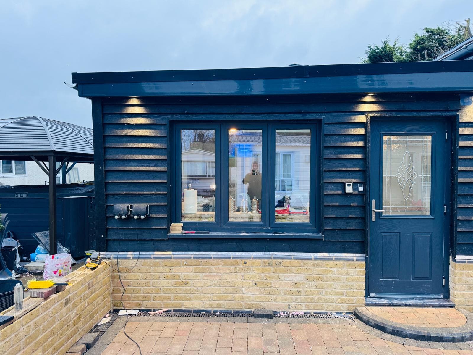 Anthracite garden room evening