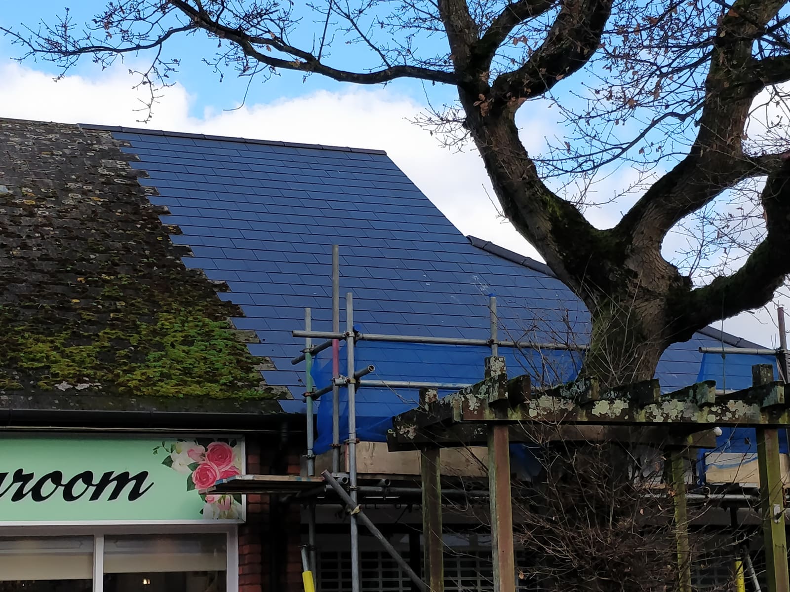 Creative Roofing carrying out moss removal in Oxfordshire